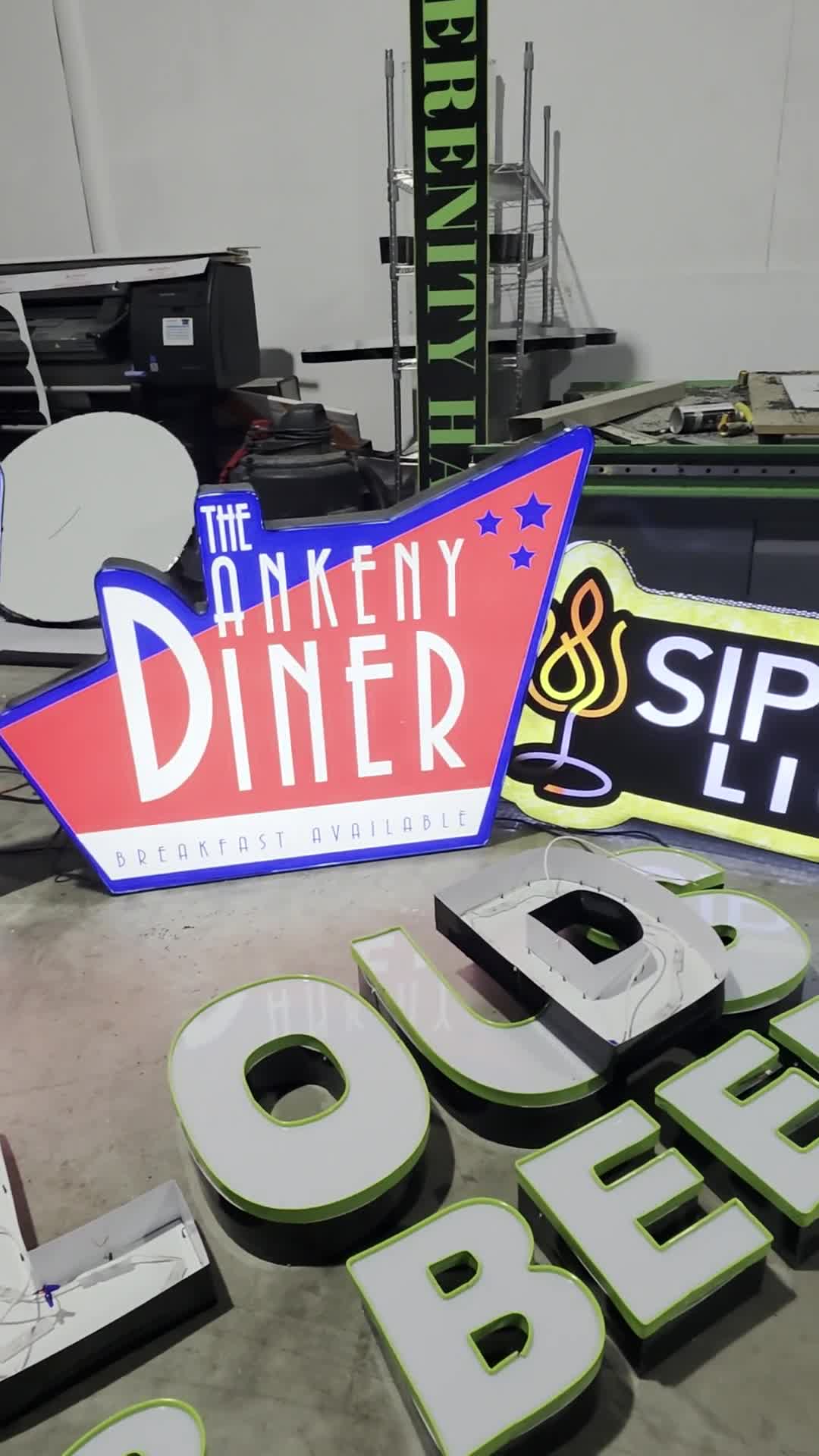 Walk through of illuminated signs and channel letters in the shop
